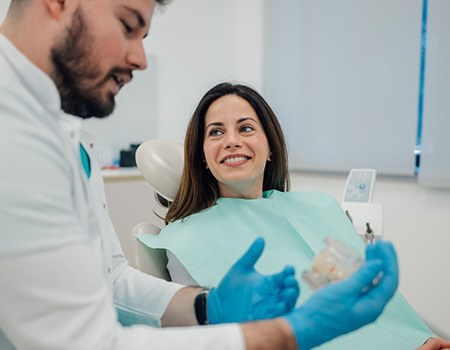 Woman smiling in the dental chair