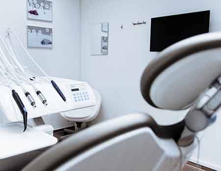 Dental chair in dentist’s exam room