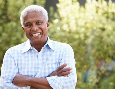 Man smiling in the great outdoors