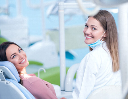 smiling woman with a dentist